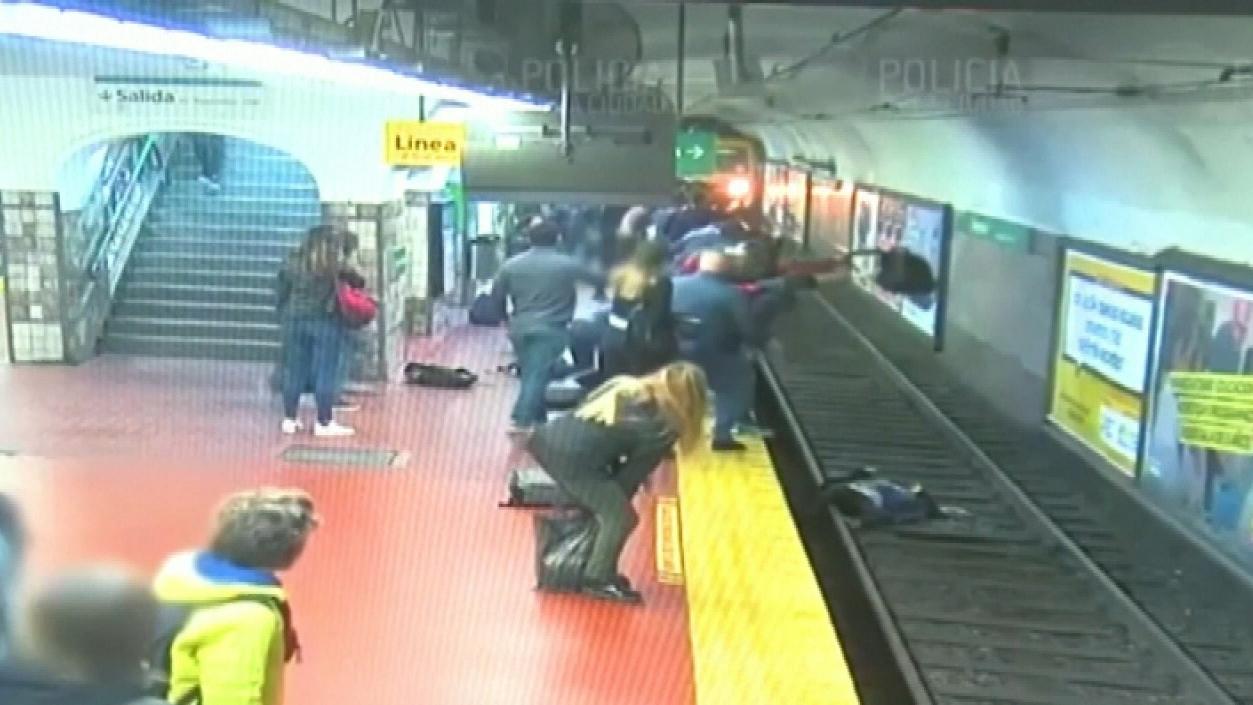 Commuters help save woman who fell onto Buenos Aires subway tracks