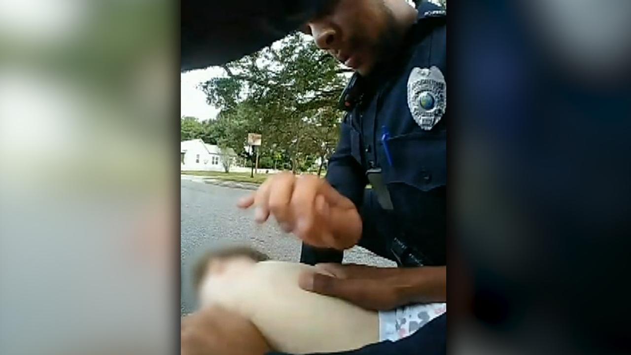 Police officers save toddler choking on a cracker
