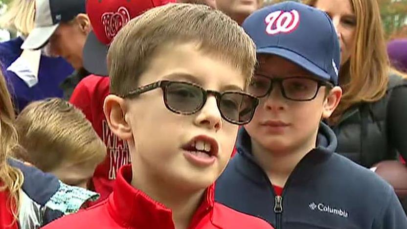 Students surprise crossing guard with tickets to World Series game