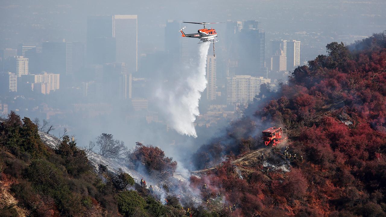 Fire crews race to tamp down Getty Fire hotspots before Santa Ana winds return to Los Angeles