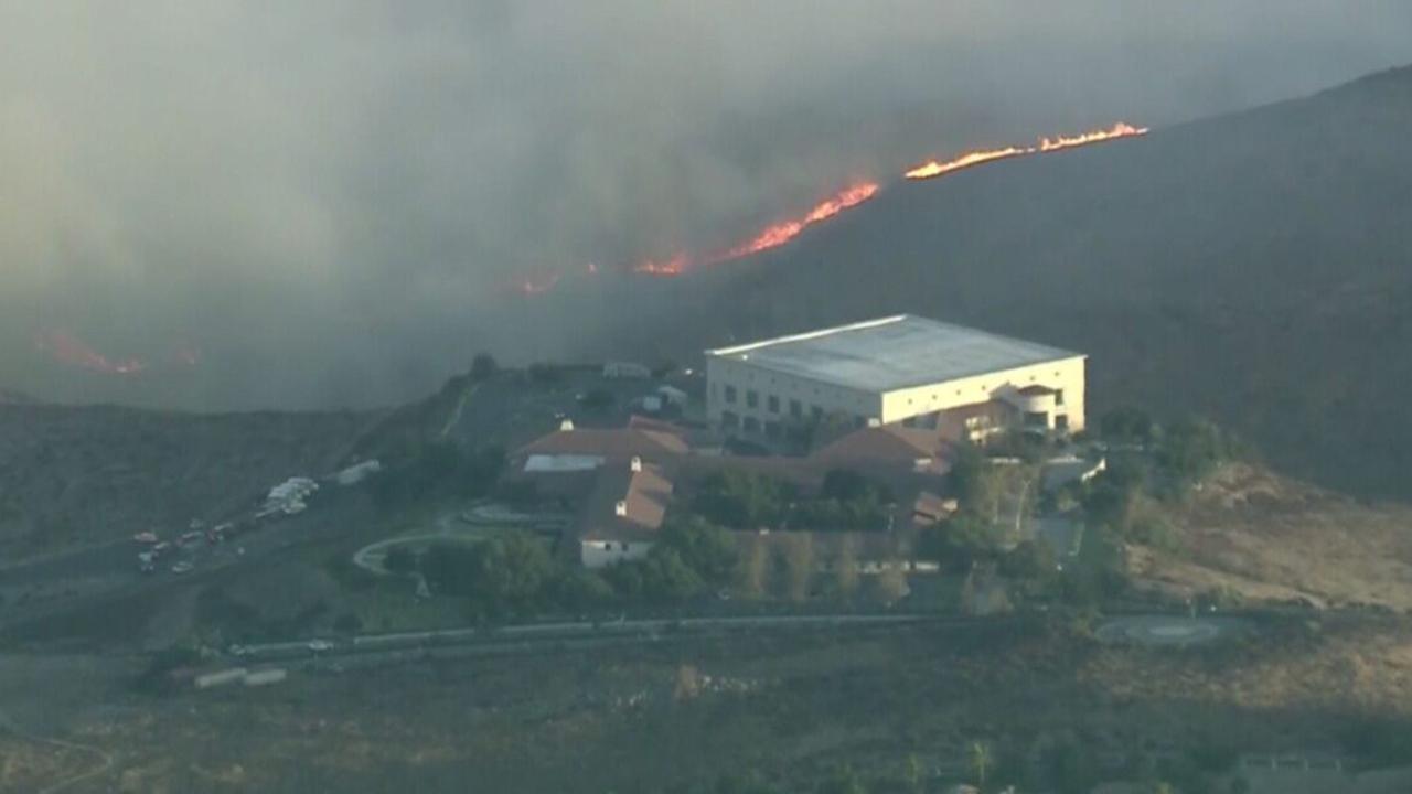 Wind-driven brushfire threatens Ronald Reagan Presidential Library in Southern California
