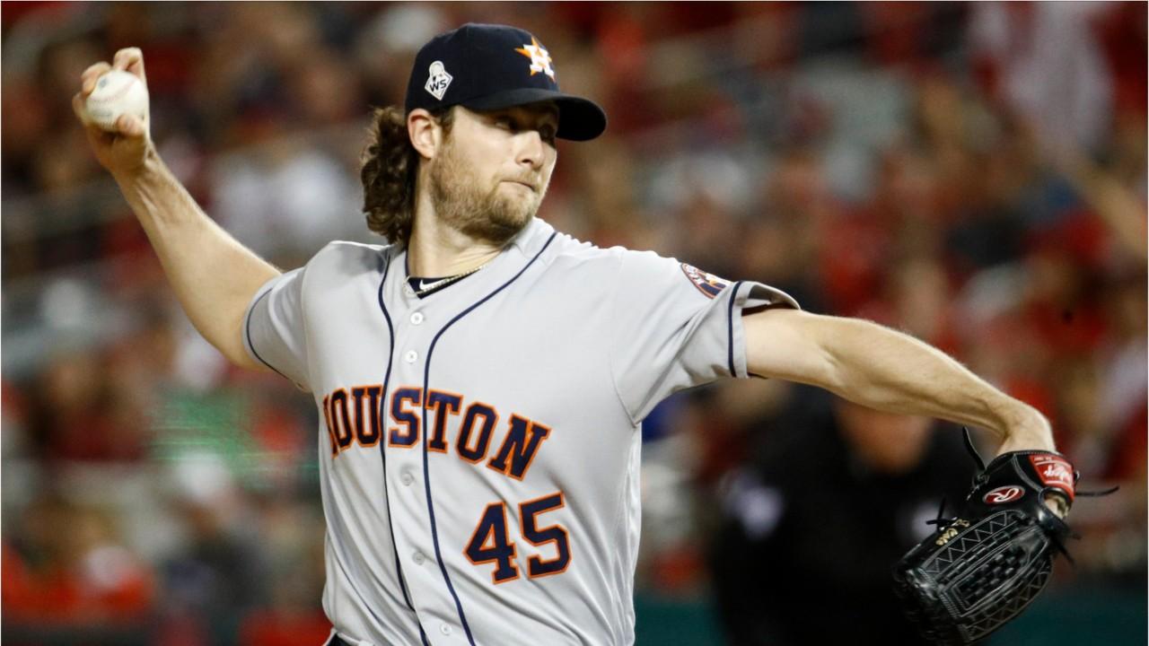 Gerrit Cole wears a cap with his agent, Scott Boras', brand on it. The free agent is now distancing himself from the Astros after their World Series loss.