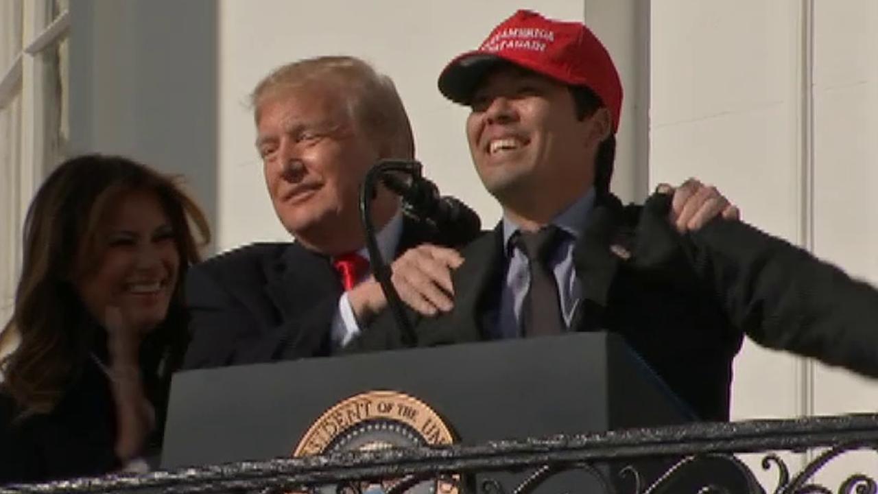 President Trump hugs MAGA-hat-wearing Nationals player	