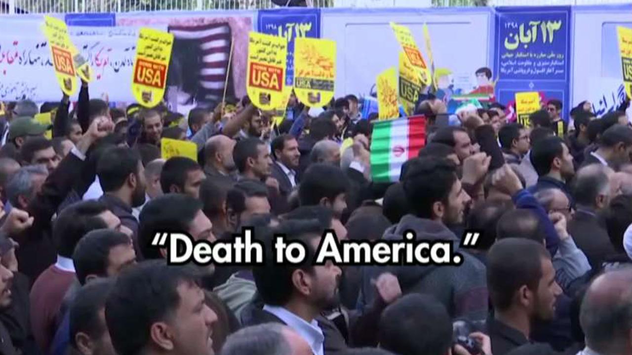 Iranians chant 'death to America' as new nuclear deal violations announced