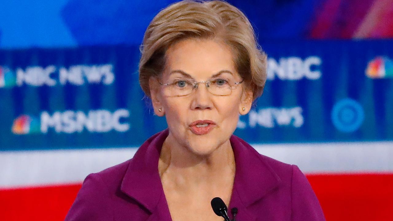 Warren pushes wealth tax plan at debate stage