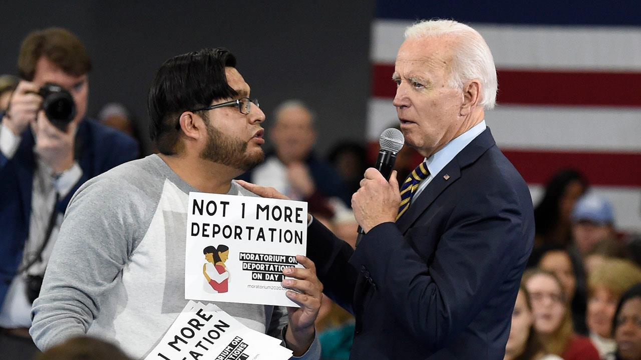 Activists interrupt Joe Biden at town hall as protesters challenge Obama-era immigration record