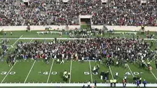 Harvard-Yale football game delayed after climate activists storm field
