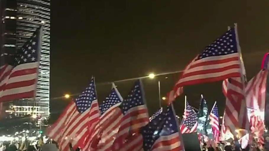 Hong Kong protesters praise Trump, wave American flags