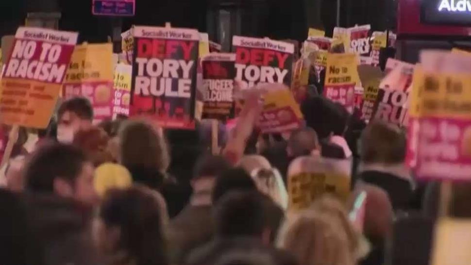 Conservative election landslide sparks protests in UK
