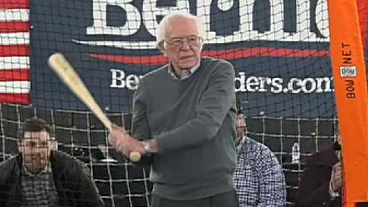 Bernie Sanders holds batting practice while meeting with Minor League Baseball players