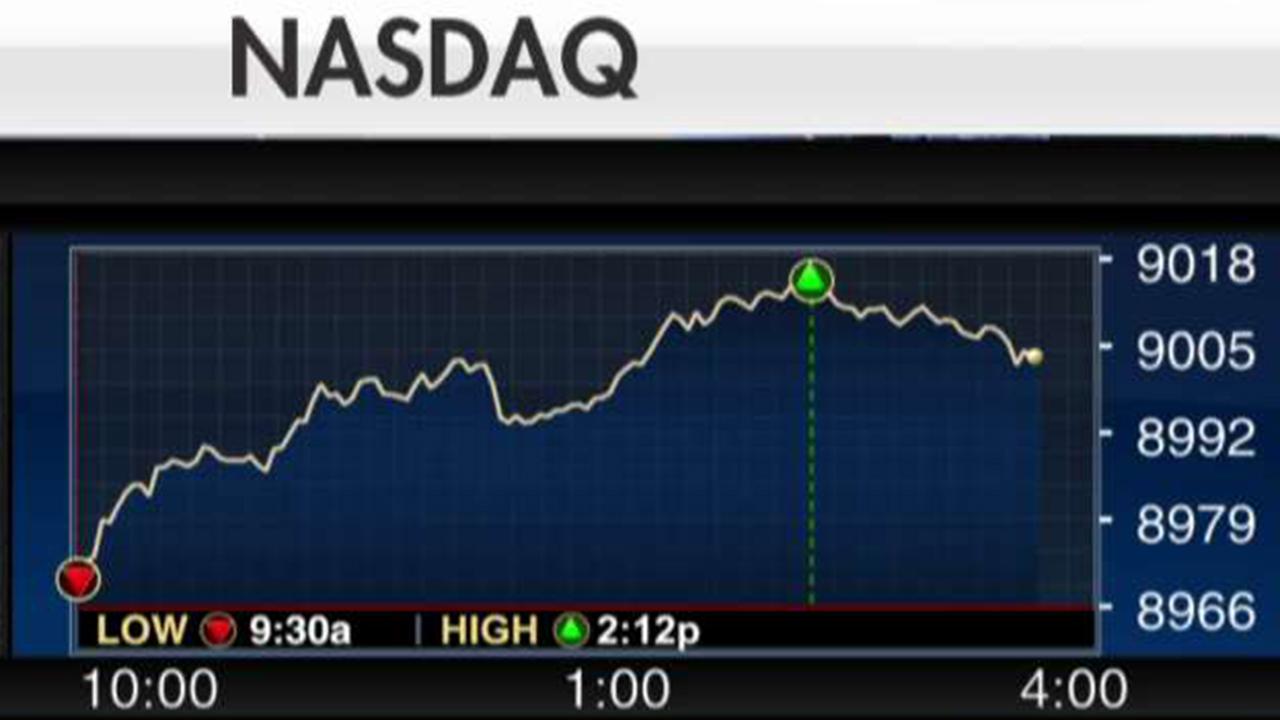 Nasdaq closes above 9,000 for the first time