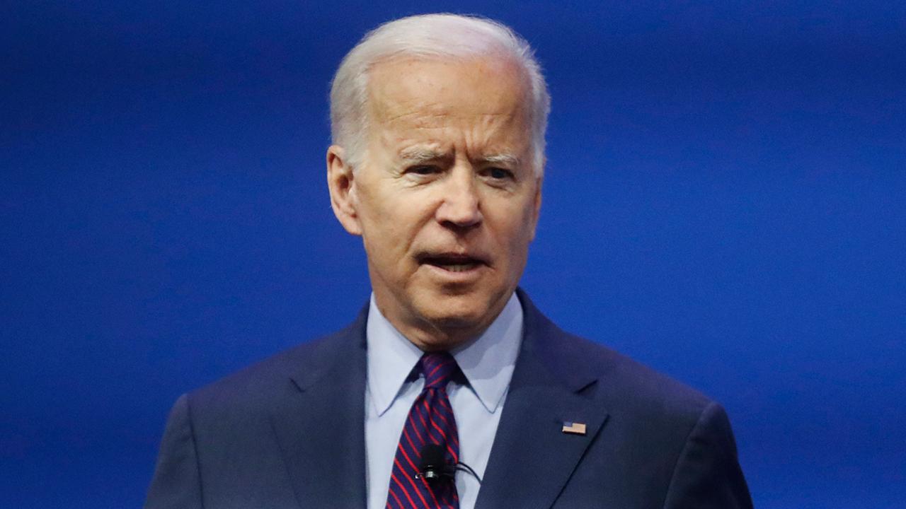 Hecklers derail Biden during New Hampshire campaign event