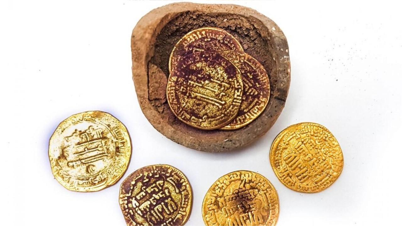 An archeological dig in Israel uncovered a secret 'piggy bank' of 1,200-year-old gold coins.