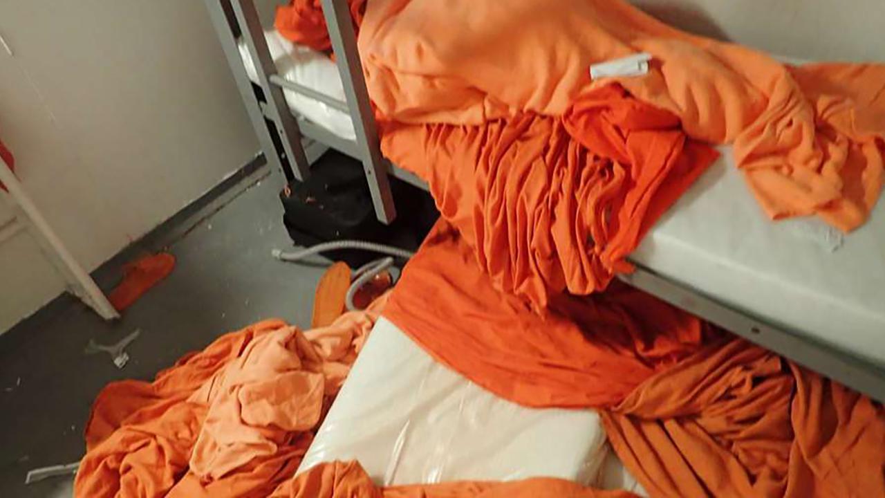 New photos from Jeffrey Epstein's autopsy and his jail cell show his neck injuries and bedsheet nooses and electrical cords in his jail cell; Bryan Llenas reports.