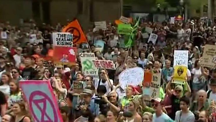 Thousands march in Sydney climate protest as Australia wildfires worsen, new evacuations ordered