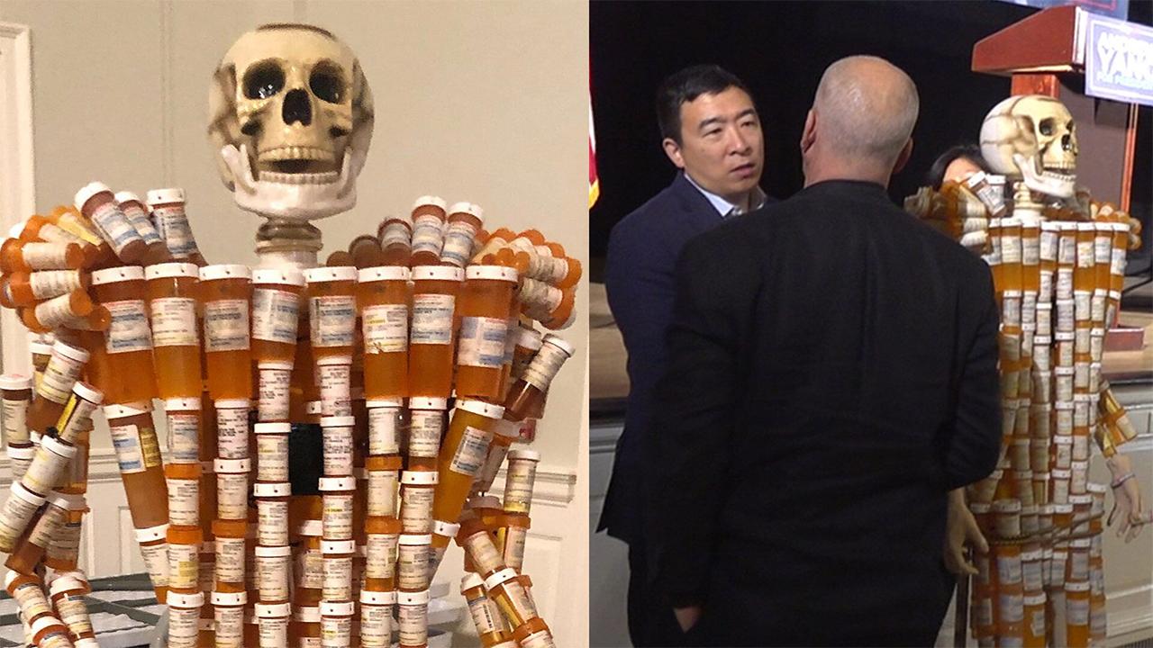 Skeleton ‘pill man’ confronts presidential candidates on opioid epidemic