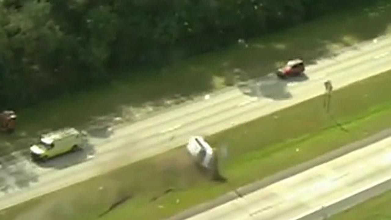 Van flips off road during dramatic police chase in Florida