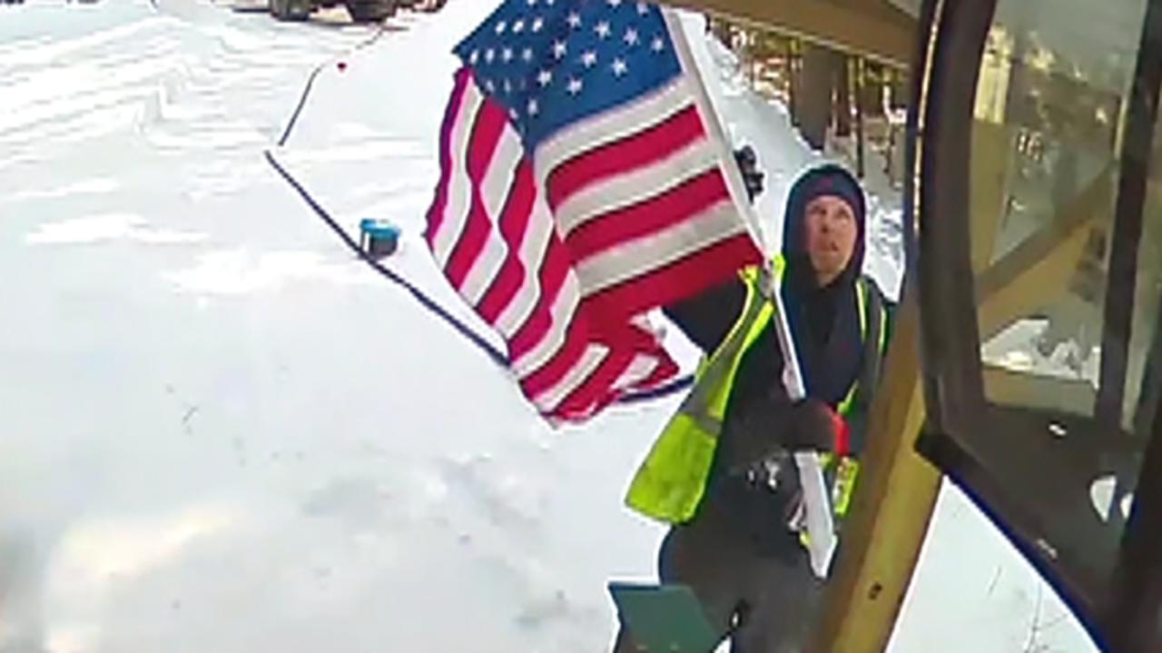 Propane deliveryman in Maine trudged through the snow to fix a fallen American flag