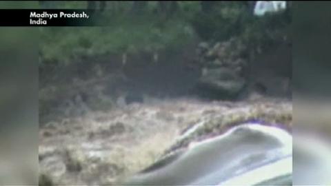 Caught on Tape: Boy Rescued from Floodwaters