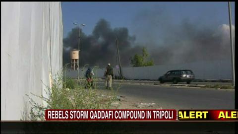 VIDEO: Steve Harrigan Ducks to Avoid Gunfire in Tripoli as Rebels Storm Qaddafi Compound