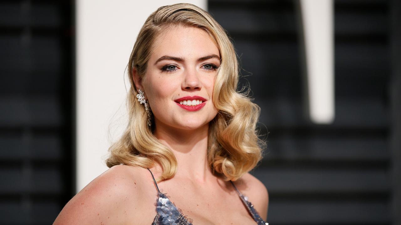 Kate Upton uses daughter Genevieve, 18 months, as a body weight