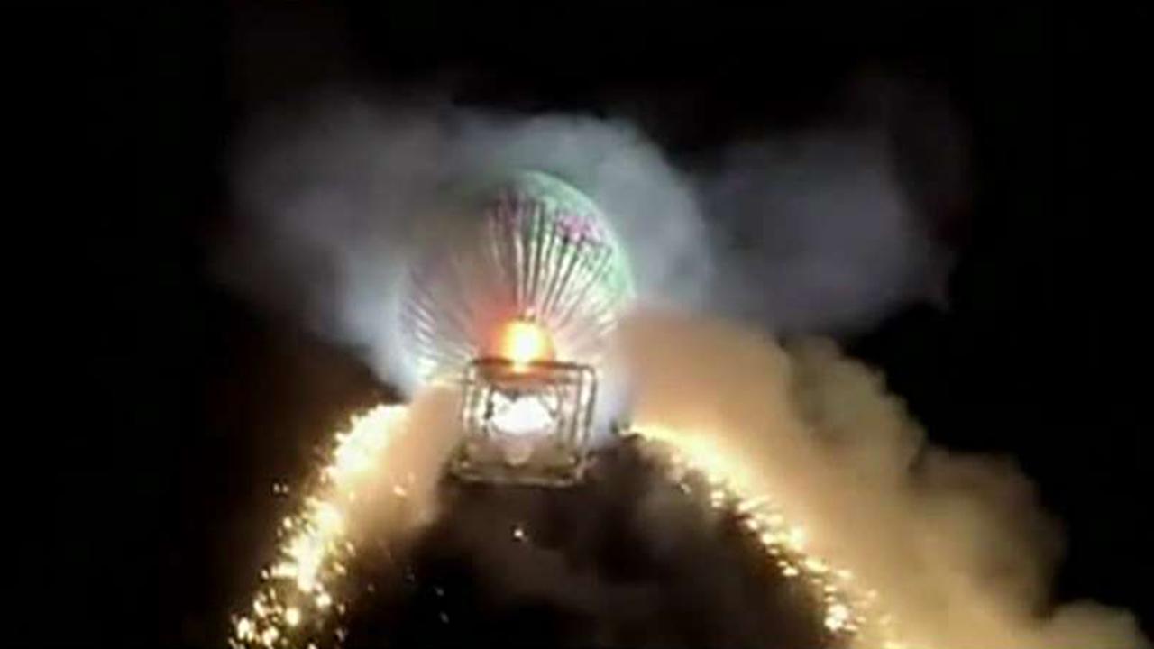 Hot air balloon filled with fireworks explodes in midair