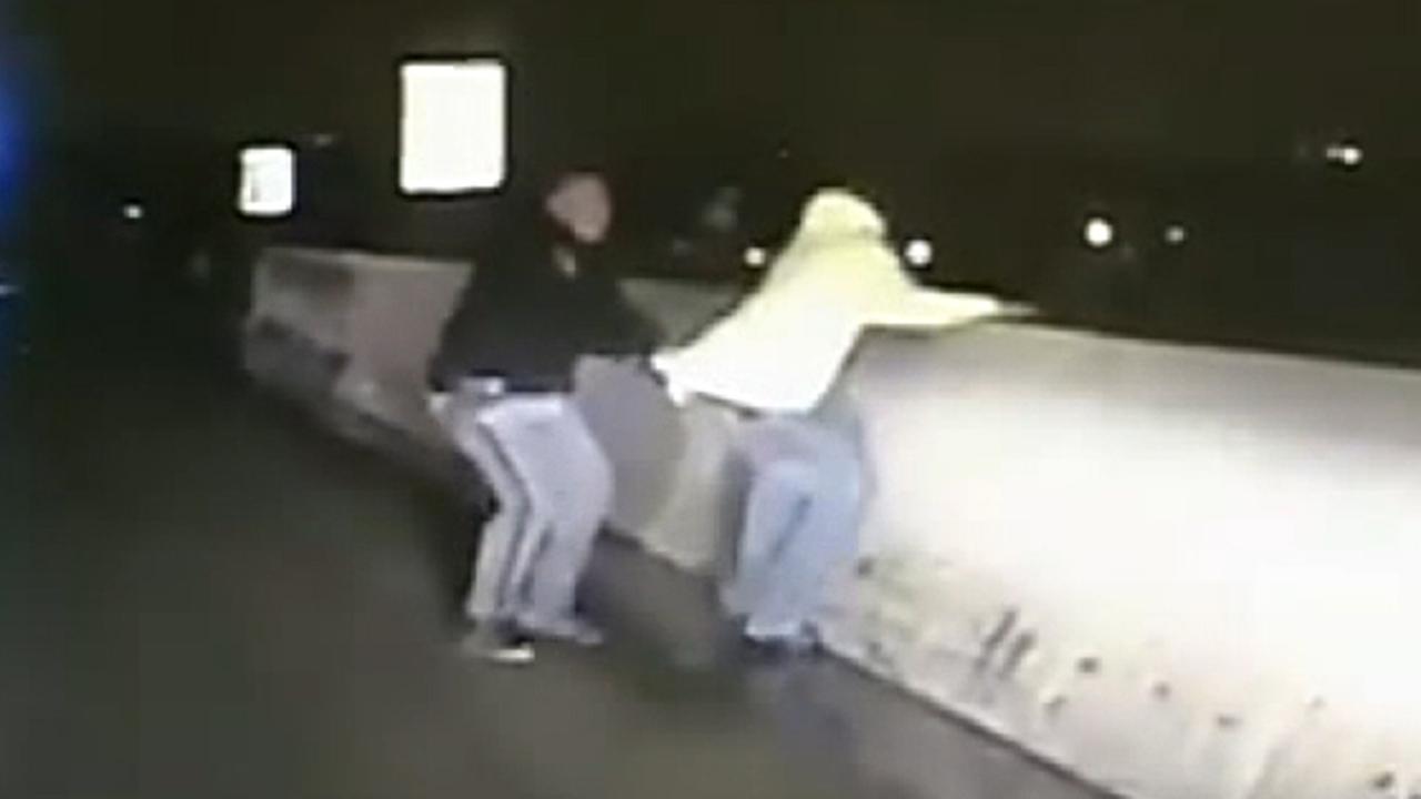 Cop tackles man threatening to jump off overpass
