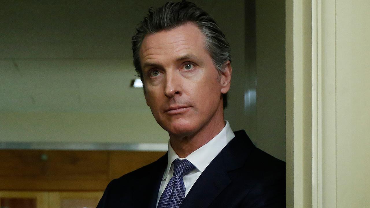 California's new progressive Gov. Gavin Newsom pledges to challenge the White House on health care and immigration