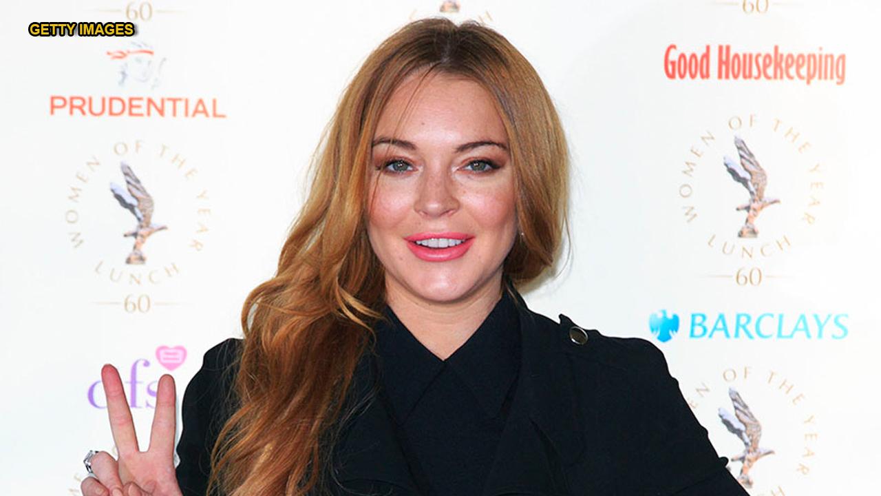 Lindsay Lohan Doesn't Fly for Fashion Shows – The Hollywood Reporter