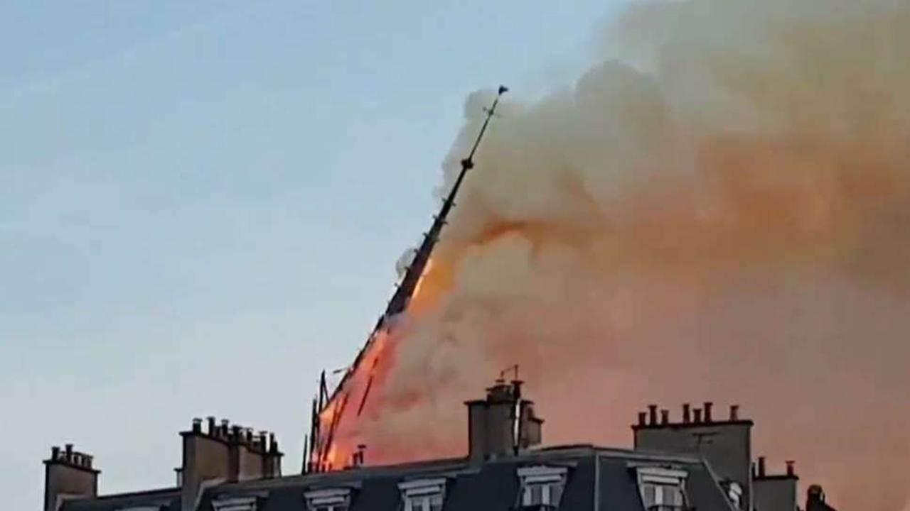 Notre Dame spire collapses during massive fire