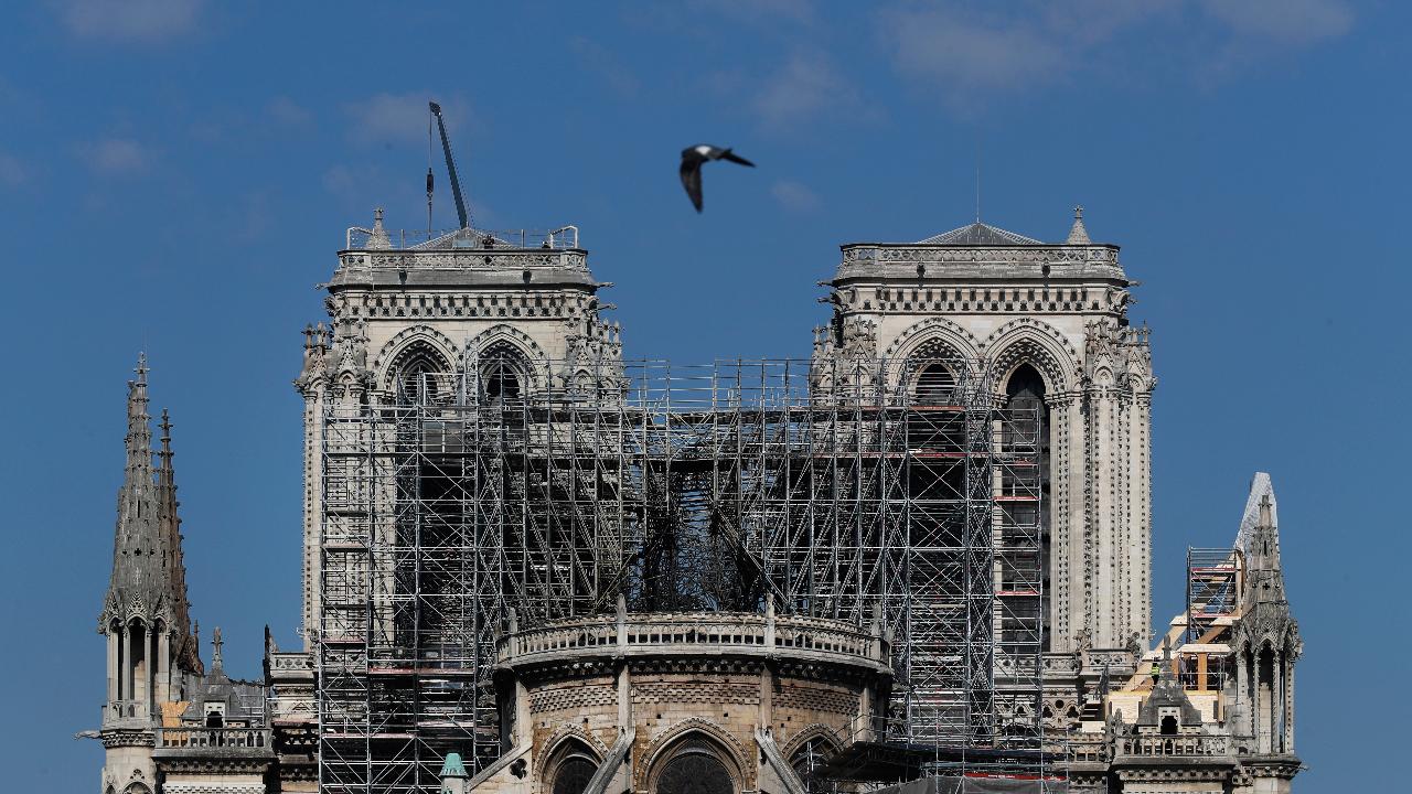 Flames burned iconic Notre Dame church for hours